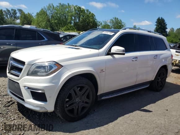 ✅ 2014 Mercedes-Benz GL 63 AMG • VIN: 4JGDF7EE0EA335978 • Lot: 63092745. Wystawiony na Copart z przebiegiem 127 083 mil. Bezpłatny archiwum sprzedaży aukcyjnych z USA i szczegółowy raport historii pojazdu na DreamBid. Zdjęcie 1.