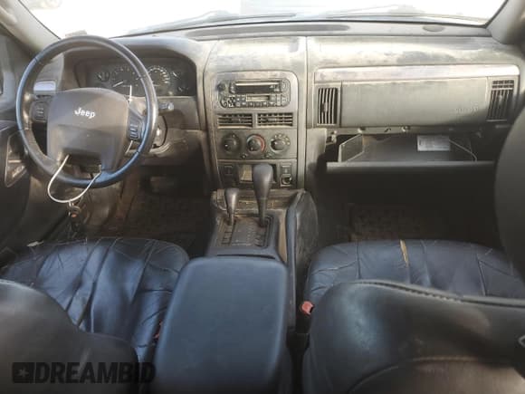 ✅ 2004 Jeep Grand Cherokee Laredo • VIN: 1J4GW48N34C240386 • Lot: 91720365. Wystawiony na Copart z przebiegiem 195 102 mil. Bezpłatny archiwum sprzedaży aukcyjnych z USA i szczegółowy raport historii pojazdu na DreamBid. Zdjęcie 8.