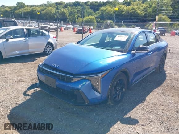 ✅ 2025 Kia K4 GT-Line Turbo • VIN: 3KPFW4DC8SE089010 • Lot: 43095561. Listed on IAAI with 11,239 mi. Free auction sales archive from the USA and detailed vehicle history report at DreamBid. Image 2.