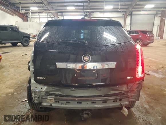 ✅ 2016 Cadillac SRX Luxury Collection • VIN: 3GYFNBE34GS520323 • Лот: 69123215. Опубликован ранее на Copart с пробегом 56 880 миль. Бесплатный доступ к архиву аукционных продаж из США и подробный отчёт об истории автомобиля на DreamBid. Изображение 6.