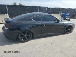 2006 Hyundai Tiburon GS с VIN KMHHM65D06U191468, выставлен на аукционе Copart как лот 70183555 с пробегом 195 594 миль миль и Списание • Salvage title. История ставок и продаж доступна на DreamBid. Изображение 3.
