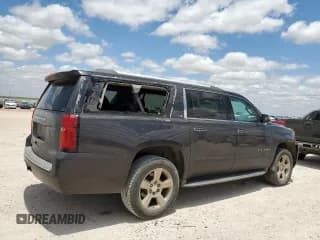 ✅ 2015 Chevrolet Suburban LTZ • VIN: 1GNSCKKC9FR585224 • Lot: 59787144. Wystawiony na Copart z przebiegiem 284 660 mil. Bezpłatny archiwum sprzedaży aukcyjnych z USA i szczegółowy raport historii pojazdu na DreamBid. Zdjęcie 3.