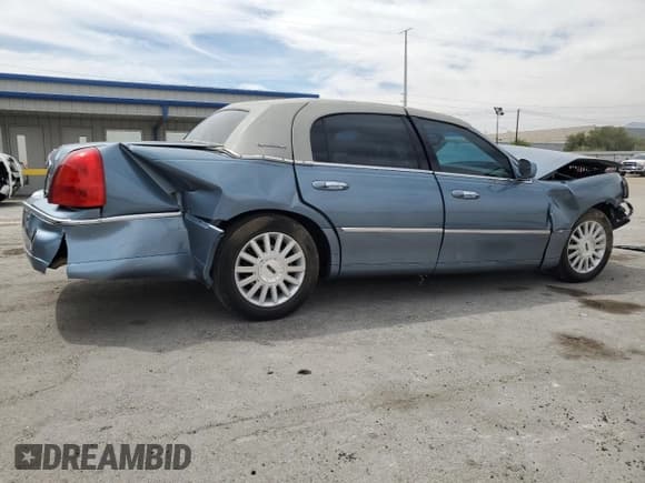 ✅ 2004 Lincoln Town Car Ultimate • VIN: 1LNHM83W34Y687080 • Lot: 67322785. Listed on Copart with 96,899 mi. Free auction sales archive from the USA and detailed vehicle history report at DreamBid. Image 3.