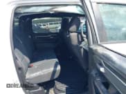 ✅ 2023 Ram 1500 Lone Star • VIN: 1C6SRFMT5PN599519 • Lot: 42921193. Listed on IAAI with 153,168 mi. Free auction sales archive from the USA and detailed vehicle history report at DreamBid. Image 8.