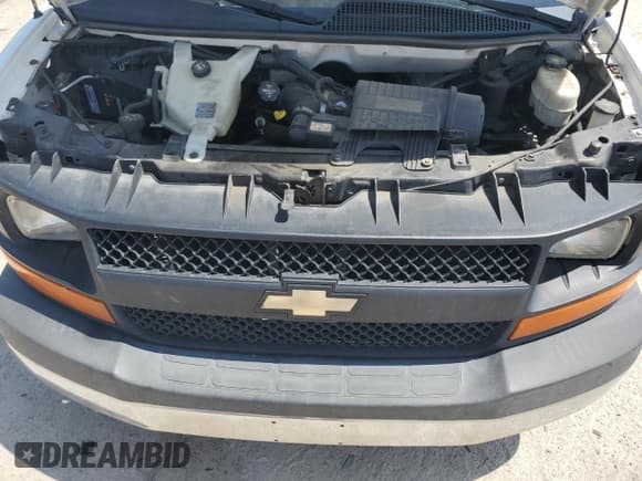 ✅ 2014 Chevrolet Express Cargo • VIN: 1GCWGFCA6E1159071 • Lot: 57384325. Listed on Copart with 203,891 mi. Free auction sales archive from the USA and detailed vehicle history report at DreamBid. Image 12.