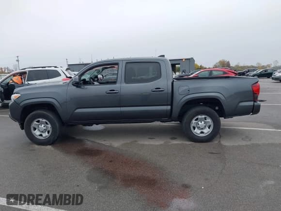 ✅ 2023 Toyota Tacoma TRD Off Road • VIN: 3TMCZ5AN5PM571369 • Lot: 43559181. Listed on IAAI with 56,795 mi. Free auction sales archive from the USA and detailed vehicle history report at DreamBid. Image 14.