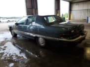 ✅ 1994 Buick Roadmaster • VIN: 1G4BN52P1RR421828 • Lot: 62710145. Listed on Copart with 130,889 mi. Free auction sales archive from the USA and detailed vehicle history report at DreamBid. Image 2.