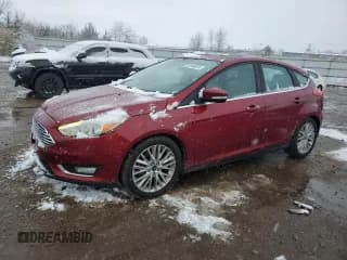 ✅ 2017 Ford Focus Titanium • VIN: 1FADP3N20HL272279 • Lot: 92166015. Listed on Copart with 99,558 mi. Free auction sales archive from the USA and detailed vehicle history report at DreamBid. Image 1.