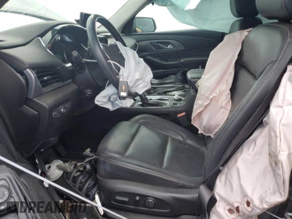 2021 Chevrolet Traverse Premier z VIN 1GNERKKW2MJ262862, wystawiony jako Copart lot #58779765 z przebiegiem 76 927 mil mil oraz Szkoda całkowita • Salvage title. Historia ofert i sprzedaży dostępna na DreamBid. Obrazek 7.