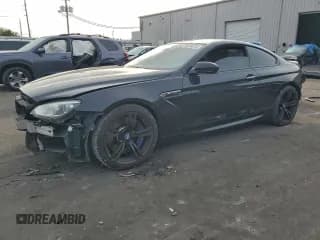✅ 2013 BMW M6 • VIN: WBSLX9C54DC968863 • Lot: 95144315. Listed on Copart with 108,345 mi. Free auction sales archive from the USA and detailed vehicle history report at DreamBid. Image 1.