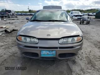 ✅ 2001 Oldsmobile Aurora • VIN: 1G3GR64H914122292 • Lot: 75867154. Wystawiony na Copart z przebiegiem 120 977 mil. Bezpłatny archiwum sprzedaży aukcyjnych z USA i szczegółowy raport historii pojazdu na DreamBid. Zdjęcie 5.