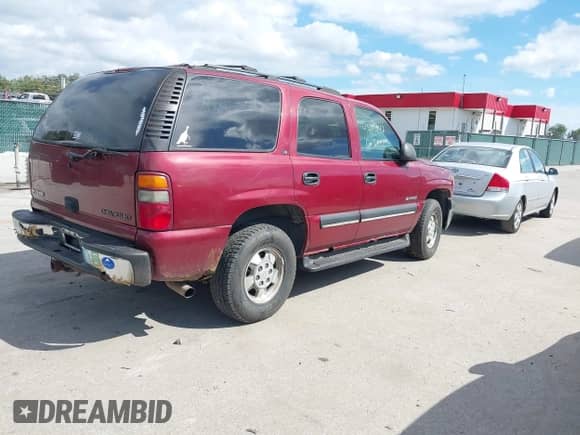 2002 Chevrolet Tahoe LT with VIN 1GNEK13Z82J174824, listed as a IAAI auction lot 43395942 with 239,860 mi miles and . Bid and sale history available at DreamBid. Image 4.