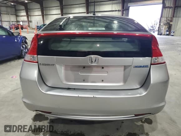 ✅ 2010 Honda Insight EX • VIN: JHMZE2H75AS003910 • Lot: 56485995. Listed on Copart with 104,685 mi. Free auction sales archive from the USA and detailed vehicle history report at DreamBid. Image 6.