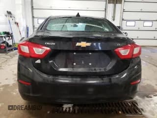 ✅ 2018 Chevrolet Cruze LT • VIN: 1G1BE5SM1J7193719 • Lot: 37223323. Listed on Copart with 105,394 mi. Free auction sales archive from the USA and detailed vehicle history report at DreamBid. Image 6.