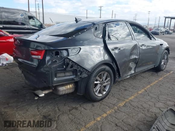 ✅ 2020 Kia Optima LX • VIN: 5XXGT4L31LG448253 • Lot: 43550559. Listed on IAAI with 59,595 mi. Free auction sales archive from the USA and detailed vehicle history report at DreamBid. Image 4.