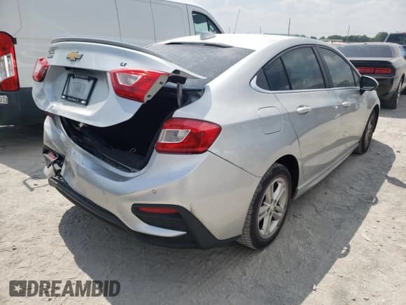 ✅ 2017 Chevrolet Cruze LT • VIN: 1G1BE5SM2H7194596 • Lot: 57413793. Listed on Copart with 111,213 mi. Free auction sales archive from the USA and detailed vehicle history report at DreamBid. Image 3.
