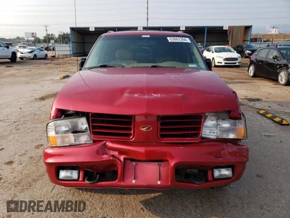 ✅ 2000 Oldsmobile Bravada • VIN: 1GHDT13W6Y2308007 • Lot: 63862394. Listed on Copart with 142,617 mi. Free auction sales archive from the USA and detailed vehicle history report at DreamBid. Image 5.