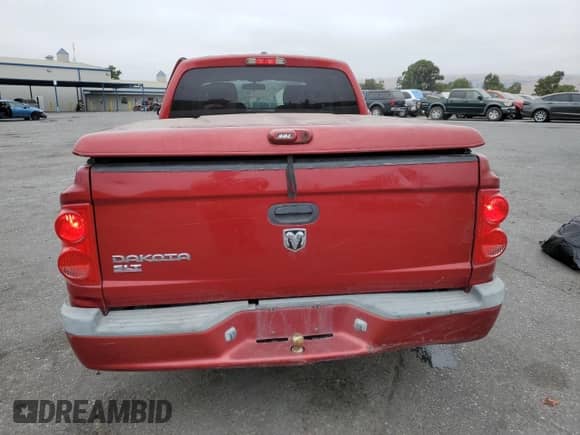 2007 Dodge Dakota SLT с VIN 1D7HE48K07S173426, выставлен на аукционе Copart как лот 71843254 с пробегом 205 125 миль миль и Списание • Salvage title. История ставок и продаж доступна на DreamBid. Изображение 6.