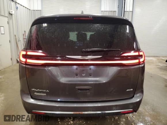 ✅ 2021 Chrysler Pacifica Touring L • VIN: 2C4RC3BG5MR549327 • Lot: 61662315. Listed on Copart with 51,802 mi. Free auction sales archive from the USA and detailed vehicle history report at DreamBid. Image 6.