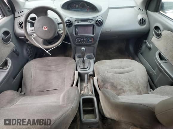 2004 Saturn ION ION 1 z VIN 1G8AG52FX4Z121029, wystawiony jako Copart lot #85560375 z przebiegiem 196 911 mil mil oraz Szkoda całkowita • Salvage title. Historia ofert i sprzedaży dostępna na DreamBid. Obrazek 8.