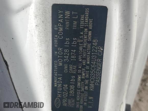 2004 Hyundai Accent GL with VIN KMHCG35C64U312248, listed as a Copart auction lot 79622234 with 107,594 mi miles and Salvage title. Bid and sale history available at DreamBid. Image 13.