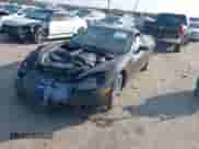 2009 Chevrolet Corvette 1LT z VIN 1G1YY25W895100585, wystawiony jako IAAI lot #43540425 z przebiegiem Nie podano mil oraz . Historia ofert i sprzedaży dostępna na DreamBid. Obrazek 16.