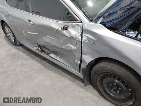 2020 Toyota Camry Hybrid LE с VIN 4T1E31AK5LU533523, выставлен на аукционе IAAI как лот 42002185 с пробегом 54 289 миль миль и . История ставок и продаж доступна на DreamBid. Изображение 6.