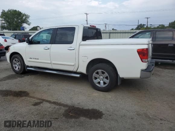 ✅ 2011 Nissan Titan SV • VIN: 1N6BA0ED4BN318885 • Lot: 69995085. Listed on Copart with 215,322 mi. Free auction sales archive from the USA and detailed vehicle history report at DreamBid. Image 2.