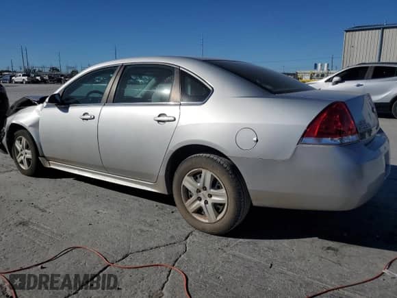 2010 Chevrolet Impala LS with VIN 2G1WA5EK1A1124792, listed as a Copart auction lot 87009105 with 71,419 mi miles and Salvage title. Bid and sale history available at DreamBid. Image 2.