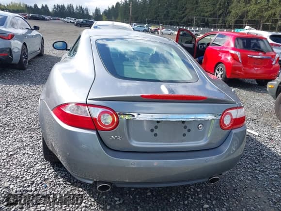 ✅ 2007 Jaguar XK • VIN: SAJWA43B675B17854 • Lot: 42003478. Listed on IAAI with 64,149 mi. Free auction sales archive from the USA and detailed vehicle history report at DreamBid. Image 16.