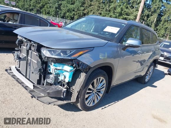 ✅ 2023 Toyota Highlander Hybrid Platinum • VIN: 5TDEBRCH1PS107605 • Lot: 42703226. Listed on IAAI with 31,511 mi. Free auction sales archive from the USA and detailed vehicle history report at DreamBid. Image 18.