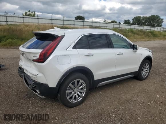✅ 2022 Cadillac XT4 AWD Premium Luxury • VIN: 1GYFZDR44NF100839 • Лот: 71855425. Опубликован ранее на Copart с пробегом 25 851 миль. Бесплатный доступ к архиву аукционных продаж из США и подробный отчёт об истории автомобиля на DreamBid. Изображение 3.