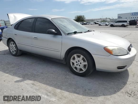 ✅ 2007 Ford Taurus SE • VIN: 1FAFP53U57A154411 • Lot: 85720085. Listed on Copart with 120,965 mi. Free auction sales archive from the USA and detailed vehicle history report at DreamBid. Image 4.