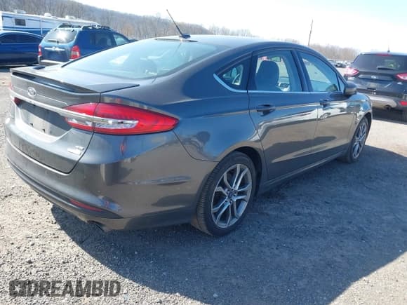✅ 2017 Ford Fusion SE • VIN: 3FA6P0HD8HR211638 • Lot: 42029399. Listed on IAAI with 90,262 mi. Free auction sales archive from the USA and detailed vehicle history report at DreamBid. Image 4.