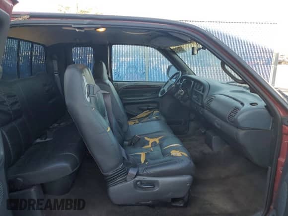 1999 Dodge 1500 с VIN 1B7HC13Z5XJ517230, выставлен на аукционе Copart как лот 83451294 с пробегом 177 533 миль миль и На запчасти • Non repairable. История ставок и продаж доступна на DreamBid. Изображение 12.