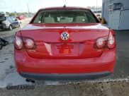 ✅ 2009 Volkswagen Jetta SE • VIN: 3VWRM71K49M150351 • Lot: 63278195. Listed on Copart with 157,248 mi. Free auction sales archive from the USA and detailed vehicle history report at DreamBid. Image 6.