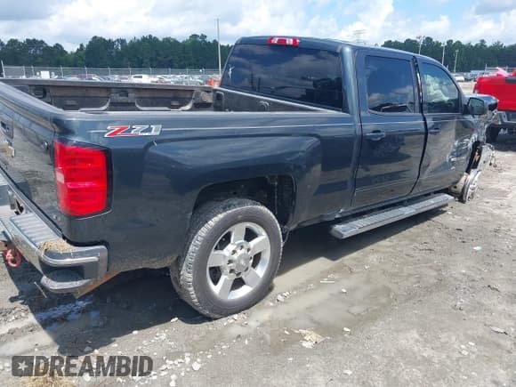 ✅ 2017 Chevrolet Silverado 2500HD LT • VIN: 1GC1KVEG1HF150872 • Lot: 42517729. Listed on IAAI with 100,405 mi. Free auction sales archive from the USA and detailed vehicle history report at DreamBid. Image 4.