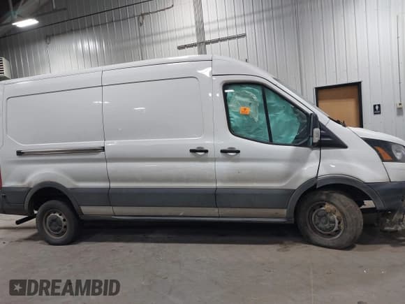 ✅ 2020 Ford Transit Cargo • VIN: 1FTBR1C88LKB56656 • Lot: 43633253. Listed on IAAI with 121,968 mi. Free auction sales archive from the USA and detailed vehicle history report at DreamBid. Image 13.