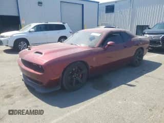 2019 Dodge Challenger SRT Hellcat с VIN 2C3CDZC91KH581396, выставлен на аукционе Copart как лот 68712015 с пробегом 42 828 миль миль и Списание • Salvage title. История ставок и продаж доступна на DreamBid. Изображение 1.