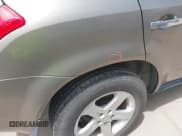 ✅ 2003 Nissan Murano SE • VIN: JN8AZ08T03W117804 • Лот: 42778128. Опубликован ранее на IAAI с пробегом 314 397 миль. Бесплатный доступ к архиву аукционных продаж из США и подробный отчёт об истории автомобиля на DreamBid. Изображение 6.