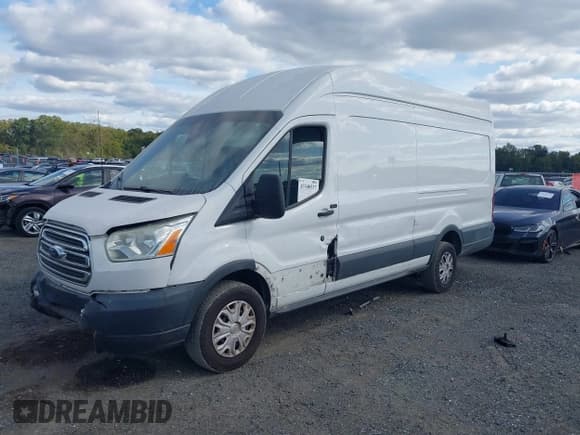 ✅ 2015 Ford Transit Cargo • VIN: 1FTSW3XG1FKA10268 • Lot: 43340537. Listed on IAAI with 100,869 mi. Free auction sales archive from the USA and detailed vehicle history report at DreamBid. Image 2.