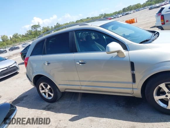 ✅ 2013 Chevrolet Captiva Sport LT • VIN: 3GNAL3EK4DS557197 • Lot: 42011329. Wystawiony na IAAI z przebiegiem 164 539 mil. Bezpłatny archiwum sprzedaży aukcyjnych z USA i szczegółowy raport historii pojazdu na DreamBid. Zdjęcie 13.