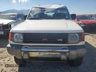 ✅ 1995 Mitsubishi Montero • VIN: JA4MR41H3SJ004800 • Лот: 72036354. Опубликован ранее на Copart с пробегом 209 635 миль. Бесплатный доступ к архиву аукционных продаж из США и подробный отчёт об истории автомобиля на DreamBid. Изображение 5.