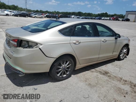 ✅ 2017 Ford Fusion Hybrid SE • VIN: 3FA6P0LU7HR355219 • Лот: 62288355. Опубликован ранее на Copart с пробегом 155 347 миль. Бесплатный доступ к архиву аукционных продаж из США и подробный отчёт об истории автомобиля на DreamBid. Изображение 3.