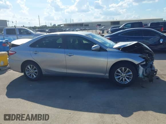 2015 Toyota Camry LE with VIN 4T4BF1FK9FR516236, listed as a IAAI auction lot 43400984 with 119,889 mi miles and . Bid and sale history available at DreamBid. Image 14.