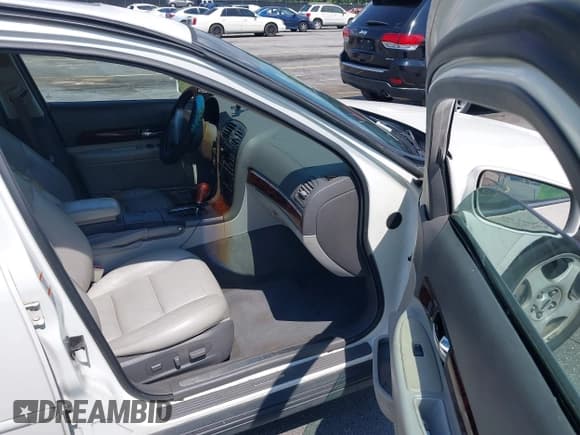 ✅ 2000 Lincoln LS • VIN: 1LNHM87A8YY897162 • Лот: 42494430. Опубликован ранее на IAAI с пробегом 220 856 миль. Бесплатный доступ к архиву аукционных продаж из США и подробный отчёт об истории автомобиля на DreamBid. Изображение 5.