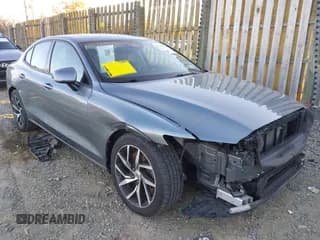 ✅ 2019 Volvo S60 Momentum • VIN: 7JRA22TK9KG002056 • Lot: 43702924. Listed on IAAI with 80,769 mi. Free auction sales archive from the USA and detailed vehicle history report at DreamBid. Image 1.