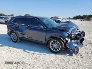 ✅ 2024 Honda CR-V EX-L • VIN: 7FARS3H7XRE002944 • Лот: 86737195. Опубликован ранее на Copart с пробегом 26 932 миль. Бесплатный доступ к архиву аукционных продаж из США и подробный отчёт об истории автомобиля на DreamBid. Изображение 4.