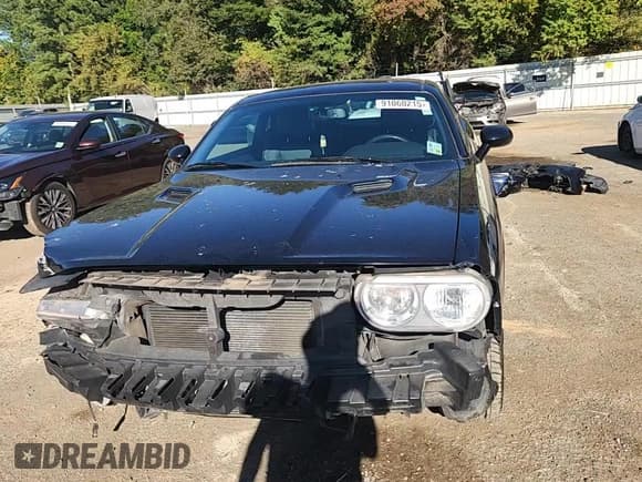 ✅ 2012 Dodge Challenger SXT Plus • VIN: 2C3CDYAG1CH148044 • Лот: 91060215. Опубликован ранее на Copart с пробегом 124 780 миль. Бесплатный доступ к архиву аукционных продаж из США и подробный отчёт об истории автомобиля на DreamBid. Изображение 14.