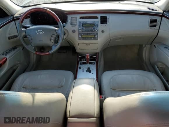 2007 Hyundai Azera SE с VIN KMHFC46F87A164195, выставлен на аукционе Copart как лот 52500115 с пробегом 191 835 миль миль и Списание • Salvage title. История ставок и продаж доступна на DreamBid. Изображение 8.